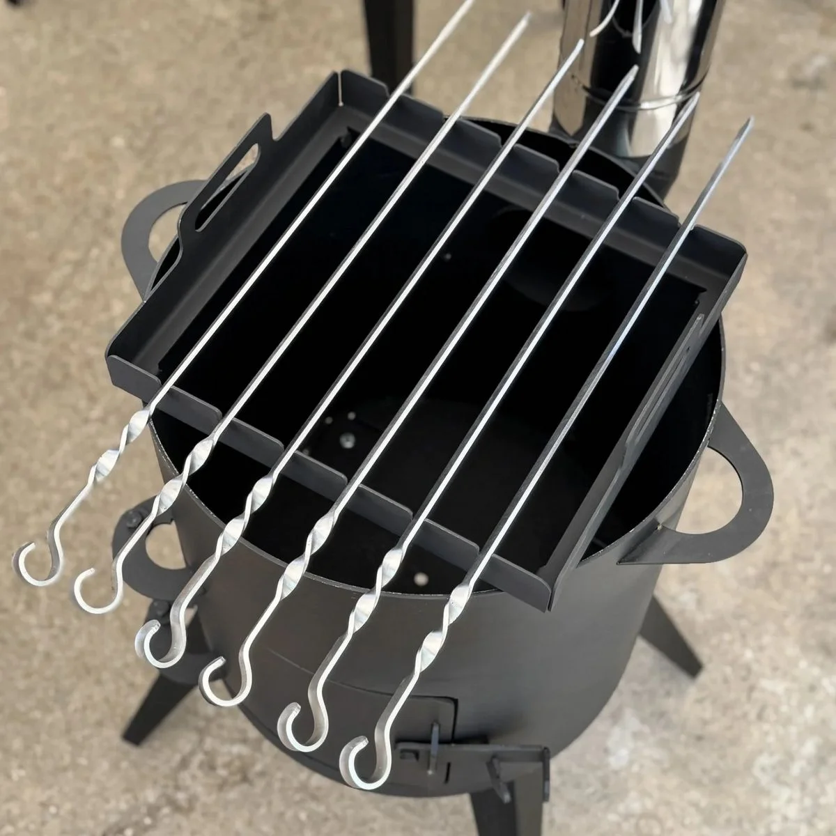 Skewer holder for cauldron stove - Image 4