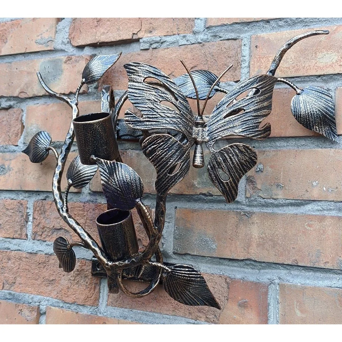 Handcrafted metal flag holder with a butterfly